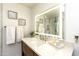 Modern bathroom with illuminated mirror and quartz countertop at 4333 E Mcdonald Dr, Phoenix, AZ 85018