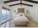 Bedroom with high ceilings, plush bed, and French doors at 4333 E Mcdonald Dr, Phoenix, AZ 85018