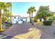 Luxury home with palm trees and brick driveway at 4333 E Mcdonald Dr, Phoenix, AZ 85018