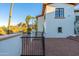 White two-story house with a mountain view and a gated entry at 4333 E Mcdonald Dr, Phoenix, AZ 85018
