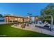 Relaxing backyard with a pool, fire pit, and pergola at 4333 E Mcdonald Dr, Phoenix, AZ 85018