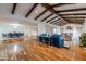 Spacious living area with hardwood floors, high ceilings, and exposed beams at 4333 E Mcdonald Dr, Phoenix, AZ 85018