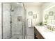 Bathroom with marble shower, vanity, and modern fixtures at 4333 E Mcdonald Dr, Phoenix, AZ 85018