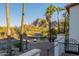 Landscaped yard with mountain views and a parked car at 4333 E Mcdonald Dr, Phoenix, AZ 85018