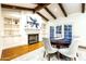 Dedicated game room with a fireplace and built-in shelving at 4333 E Mcdonald Dr, Phoenix, AZ 85018