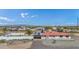 Aerial view of house with pool, solar panels, and distant mountains at 14700 S Tuthill Rd, Buckeye, AZ 85326