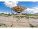 Property features a large covered barn or storage area at 14700 S Tuthill Rd, Buckeye, AZ 85326