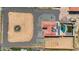 Aerial view showing a house with pool and surrounding land at 14700 S Tuthill Rd, Buckeye, AZ 85326