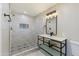 Modern bathroom with marble-tiled shower and vanity at 14700 S Tuthill Rd, Buckeye, AZ 85326
