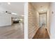 Hallway view of kitchen and living areas at 14700 S Tuthill Rd, Buckeye, AZ 85326