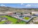 Aerial view of a house with pool, landscaped yard, and playground at 14700 S Tuthill Rd, Buckeye, AZ 85326