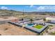 Aerial view of home with pool and surrounding landscape at 14700 S Tuthill Rd, Buckeye, AZ 85326
