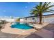 Relaxing pool area with diving board, surrounded by a spacious backyard at 14700 S Tuthill Rd, Buckeye, AZ 85326