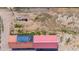 Aerial view of building with solar panels and large yard at 14700 S Tuthill Rd, Buckeye, AZ 85326