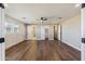 Large bedroom with wood floors and access to bathroom at 14700 S Tuthill Rd, Buckeye, AZ 85326