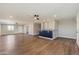 Spacious living area with wood floors and a breakfast bar at 14700 S Tuthill Rd, Buckeye, AZ 85326