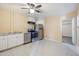 Modern kitchen with stainless steel appliances and white cabinets at 14700 S Tuthill Rd, Buckeye, AZ 85326