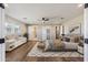 Spacious bedroom with wood floors and an ensuite bathroom at 14700 S Tuthill Rd, Buckeye, AZ 85326