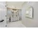 Updated bathroom with double vanity and a walk-in shower at 14700 S Tuthill Rd, Buckeye, AZ 85326