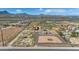 Aerial view of property, showcasing expansive land and a large house at 14700 S Tuthill Rd, Buckeye, AZ 85326