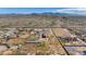 Aerial view of expansive property with large lot and mountain views at 14700 S Tuthill Rd, Buckeye, AZ 85326