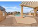 Community pool with pergola and surrounding patio at 2625 E 10Th St, Tempe, AZ 85288