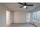 Spacious bedroom with ceiling fan and access to the backyard at 2625 E 10Th St, Tempe, AZ 85288