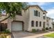 Two-story house with attached garage and landscaping at 1432 E Sonrisas St, Phoenix, AZ 85040