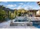Inviting pool and spa area with mountain views and a pergola at 6616 E El Sendero Rd, Carefree, AZ 85377