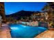 Stunning pool and spa area with mountain backdrop and multiple seating areas at 6616 E El Sendero Rd, Carefree, AZ 85377