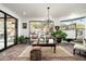 Relaxing sitting area with views, filled with natural light and plants at 6616 E El Sendero Rd, Carefree, AZ 85377