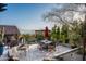 Stone patio with dining table and chairs, offering scenic views at 6616 E El Sendero Rd, Carefree, AZ 85377