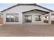 Private backyard with covered patio and ample space at 682 E Aurora Dr, San Tan Valley, AZ 85140