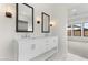 Modern bathroom with double vanity and marble flooring at 682 E Aurora Dr, San Tan Valley, AZ 85140