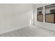 Spacious bedroom with carpeted floors and large windows at 682 E Aurora Dr, San Tan Valley, AZ 85140