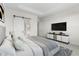 Spacious primary bedroom with large windows and en-suite bathroom at 682 E Aurora Dr, San Tan Valley, AZ 85140
