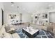Modern kitchen with open layout, island, and breakfast bar at 682 E Aurora Dr, San Tan Valley, AZ 85140