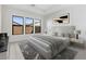 Main bedroom with plush carpet and large windows at 682 E Aurora Dr, San Tan Valley, AZ 85140