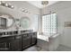 Elegant bathroom with double sinks, granite countertops, and a large walk-in shower at 5221 E Thunder Hawk Rd, Cave Creek, AZ 85331