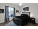 Well-lit bedroom with a comfortable bed and plenty of natural light at 5221 E Thunder Hawk Rd, Cave Creek, AZ 85331