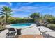 Inviting kidney-shaped pool with flagstone patio at 5221 E Thunder Hawk Rd, Cave Creek, AZ 85331
