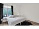 Bright bedroom with a queen-size bed and dark curtains at 5221 E Thunder Hawk Rd, Cave Creek, AZ 85331