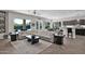 Open living room with large sectional sofa and herringbone floors at 5221 E Thunder Hawk Rd, Cave Creek, AZ 85331