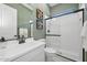 Clean bathroom with white subway tiles and a glass shower at 668 E Aurora Dr, San Tan Valley, AZ 85140