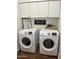 Bright laundry room with Samsung washer and dryer at 1436 W Windhaven Ave, Gilbert, AZ 85233