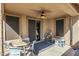 Covered patio with table and chairs, great for outdoor dining at 21527 N 78Th Ln, Peoria, AZ 85382