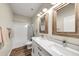 Clean bathroom with double sinks and modern fixtures at 21527 N 78Th Ln, Peoria, AZ 85382