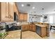 Modern kitchen with stainless steel appliances and granite counters at 21527 N 78Th Ln, Peoria, AZ 85382