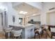 Modern kitchen with granite counters and white cabinets at 11166 E Prospect Point Dr, Scottsdale, AZ 85262