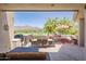 Outdoor dining area with mountain views and a built-in grill at 11166 E Prospect Point Dr, Scottsdale, AZ 85262